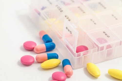 drugs and medicine inside a pill organizer